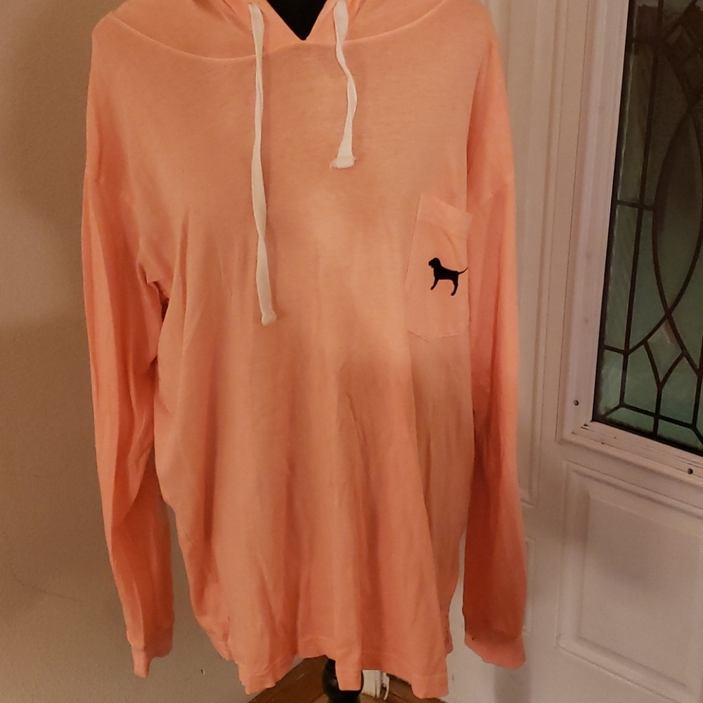 Light orange long sleeve PINK shirt with hood.